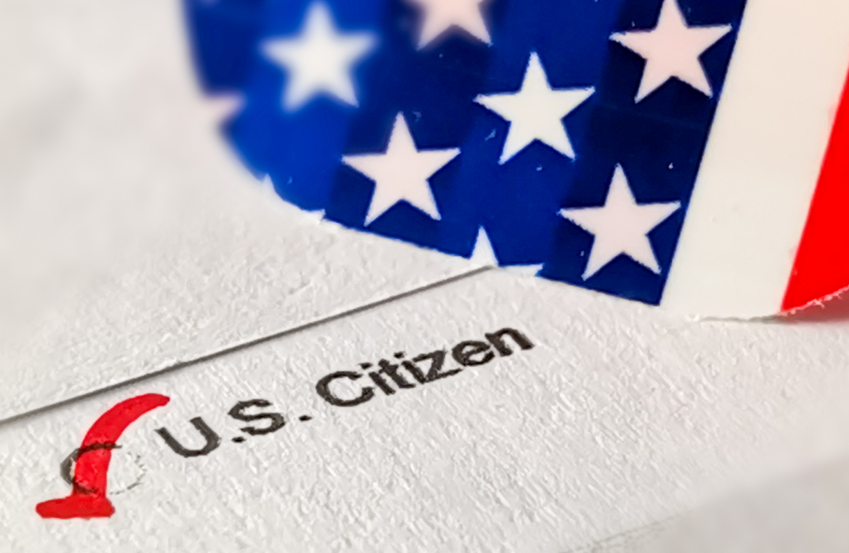 Picture of Amerian Flag and a check mark next to the word "U.S." Citizen.