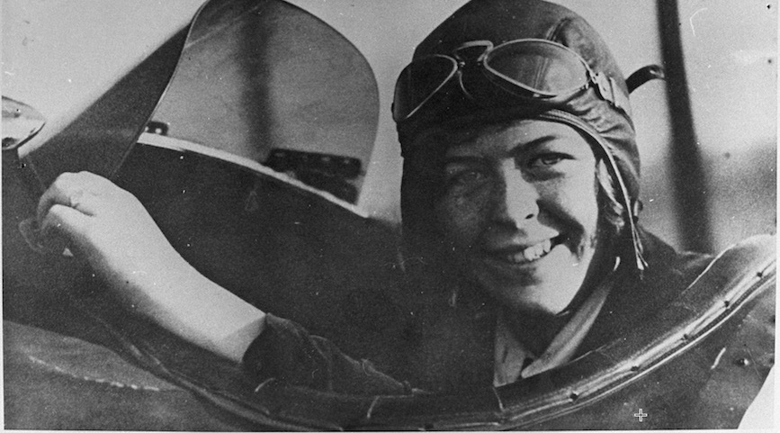 Close up if Elinor Smith seated in an airplane