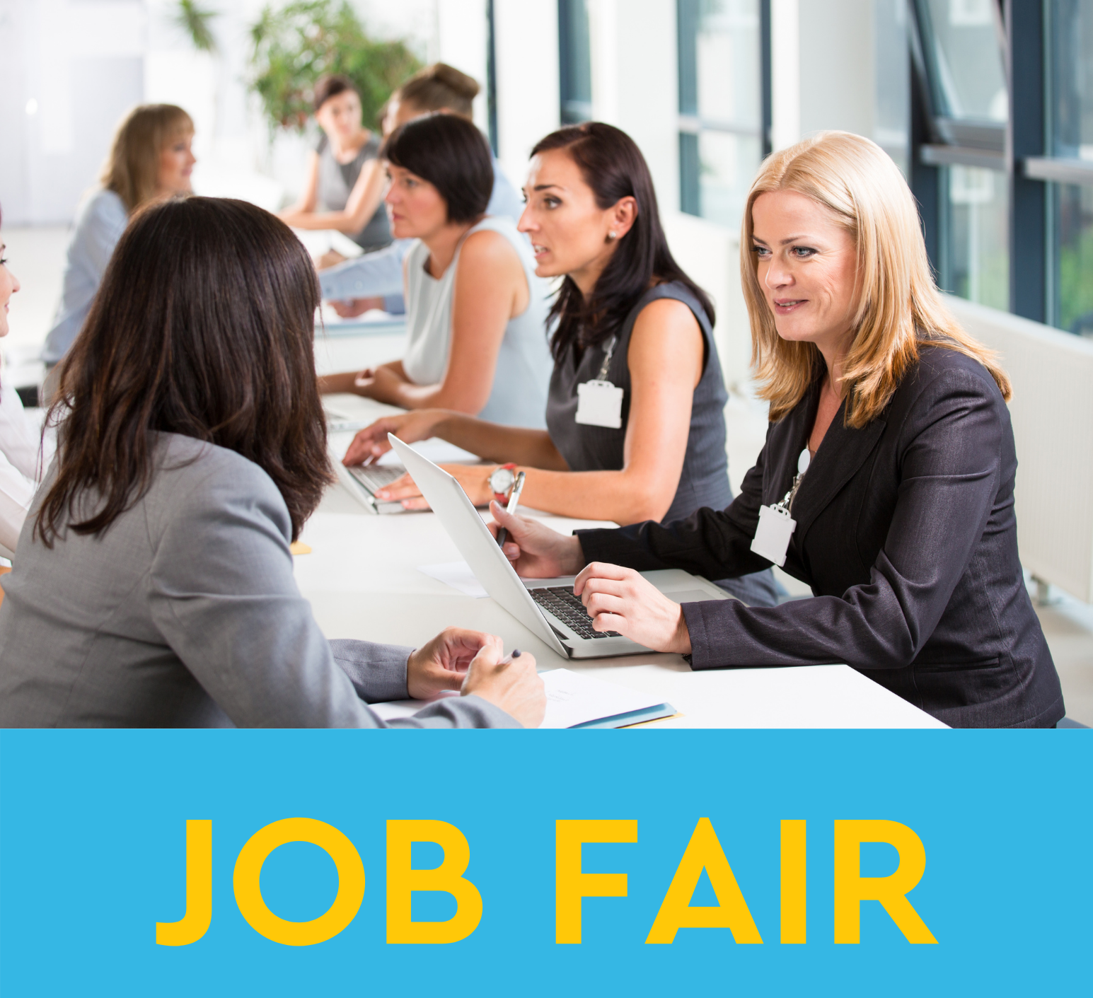 Picture of people meeting with each other across a table, in business suits. The words "JOB FAIR" are written below the picture.