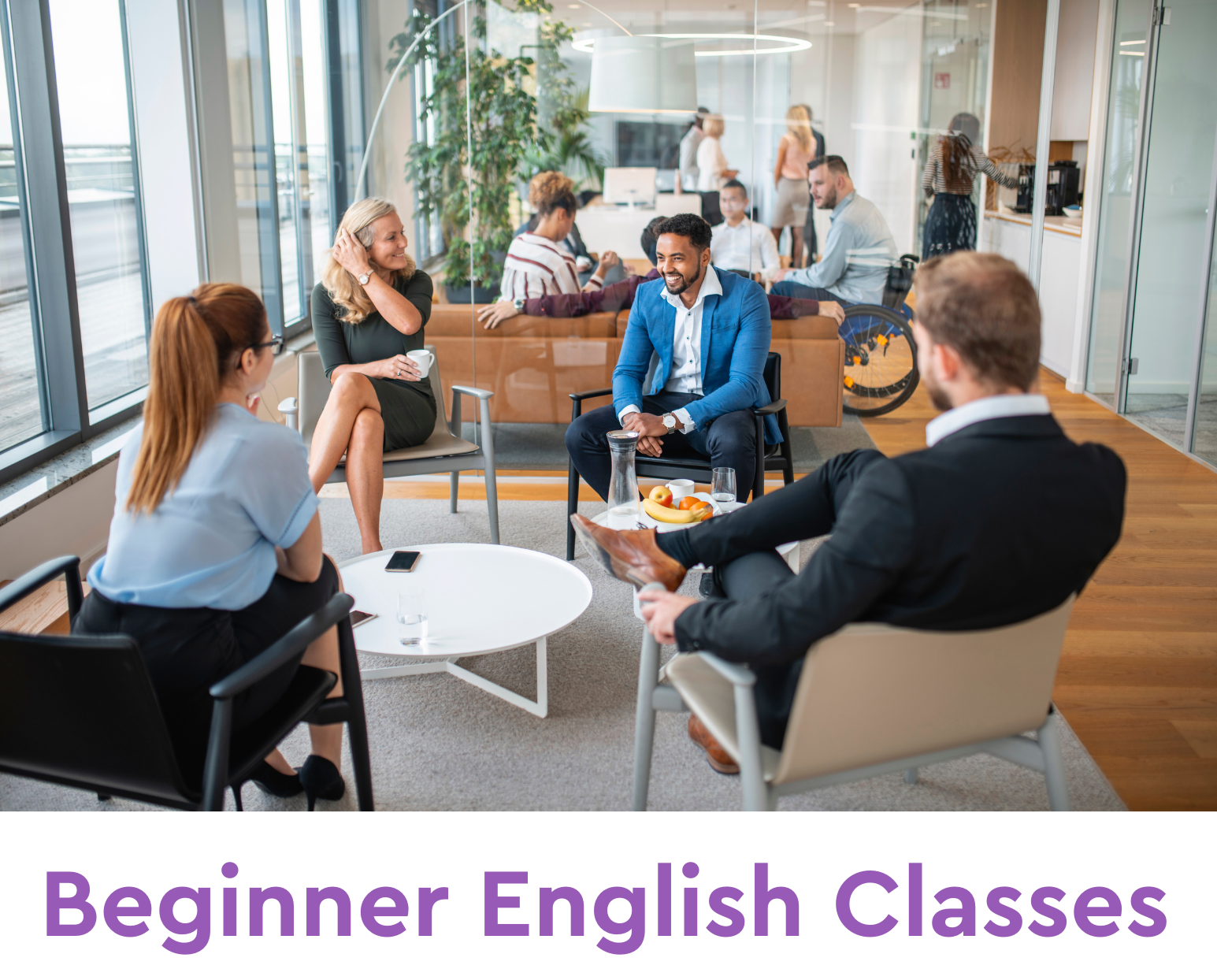 Picture of people talking, seated around a table, and the words "Basic English Classes" below the picture.