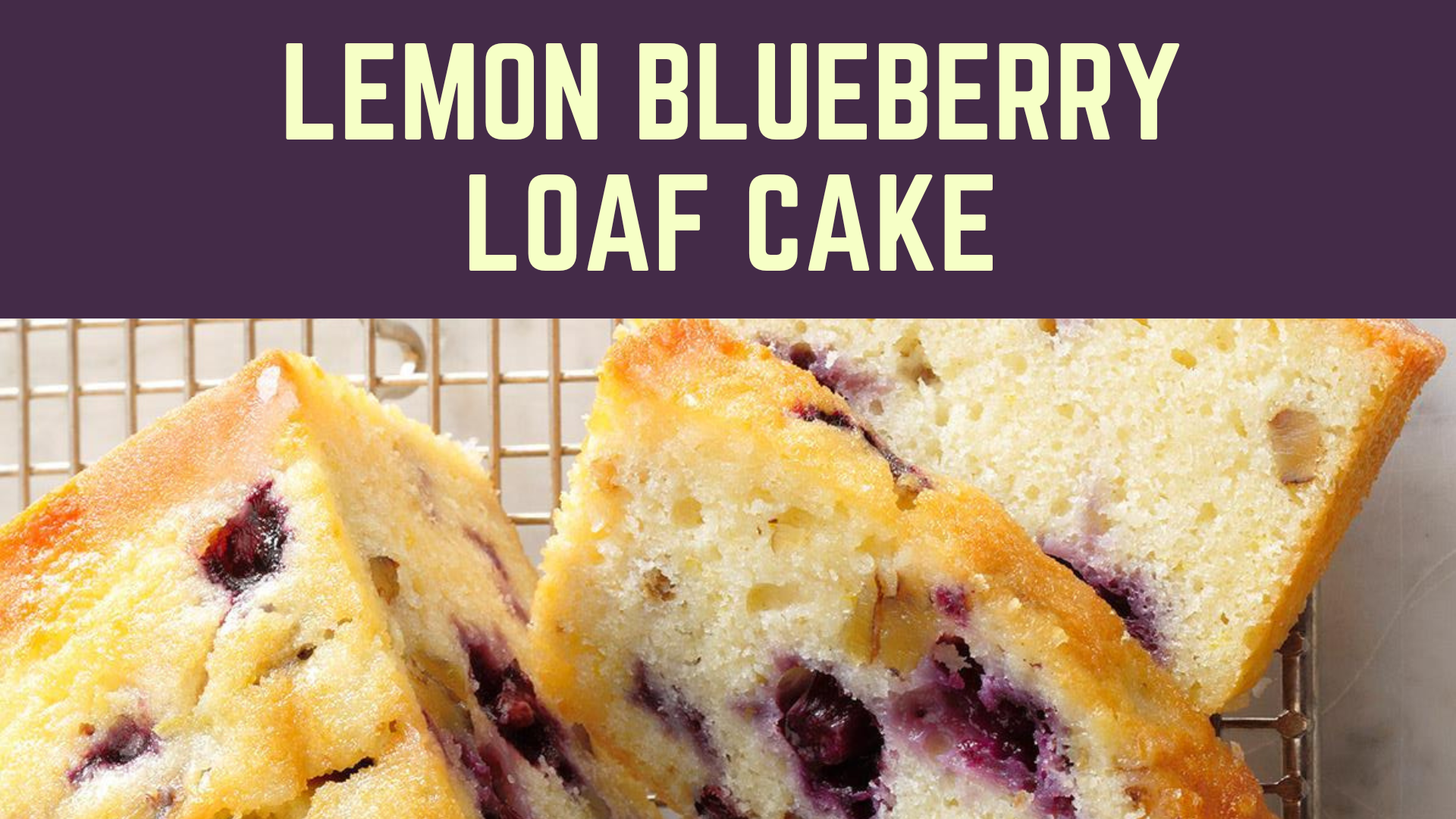 A close-up photo of a loaf of lemon blueberry loaf cake with a couple of slices sliced off of it.