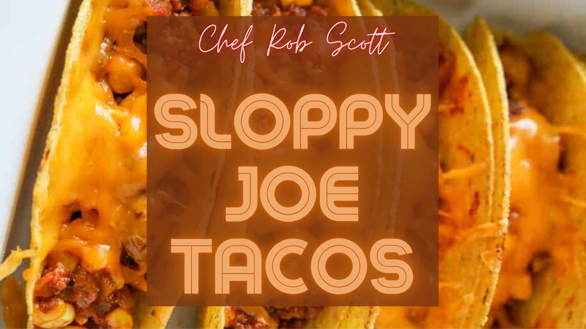 A row of sloppy joe tacos in a dish.