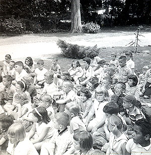 Story time was often held outside to accommodate the large groups