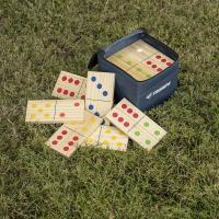 large format dominoes in a bag spilt over onto grass