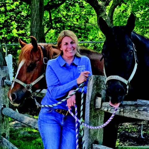 Facilitator with horses.