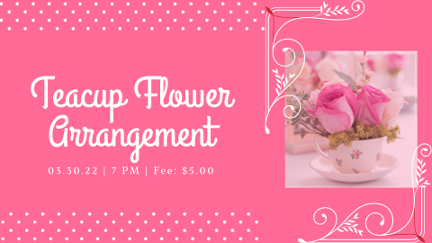 Photo of a antique-looking teacup with a flower arrangement on a pink background.