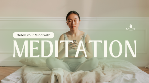 A woman sitting cross-legged meditating