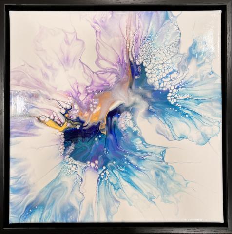 A painting made using the paint pouring method.