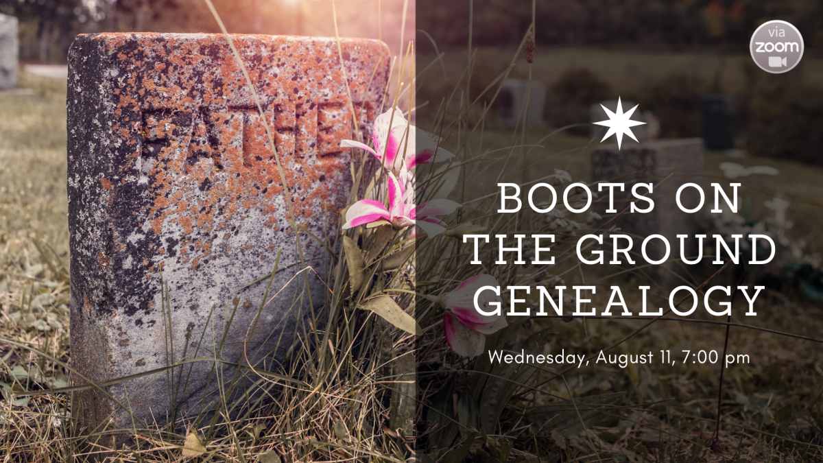 An old headstone at a cemetery that says "Father" on it. Flowers are in front of it.