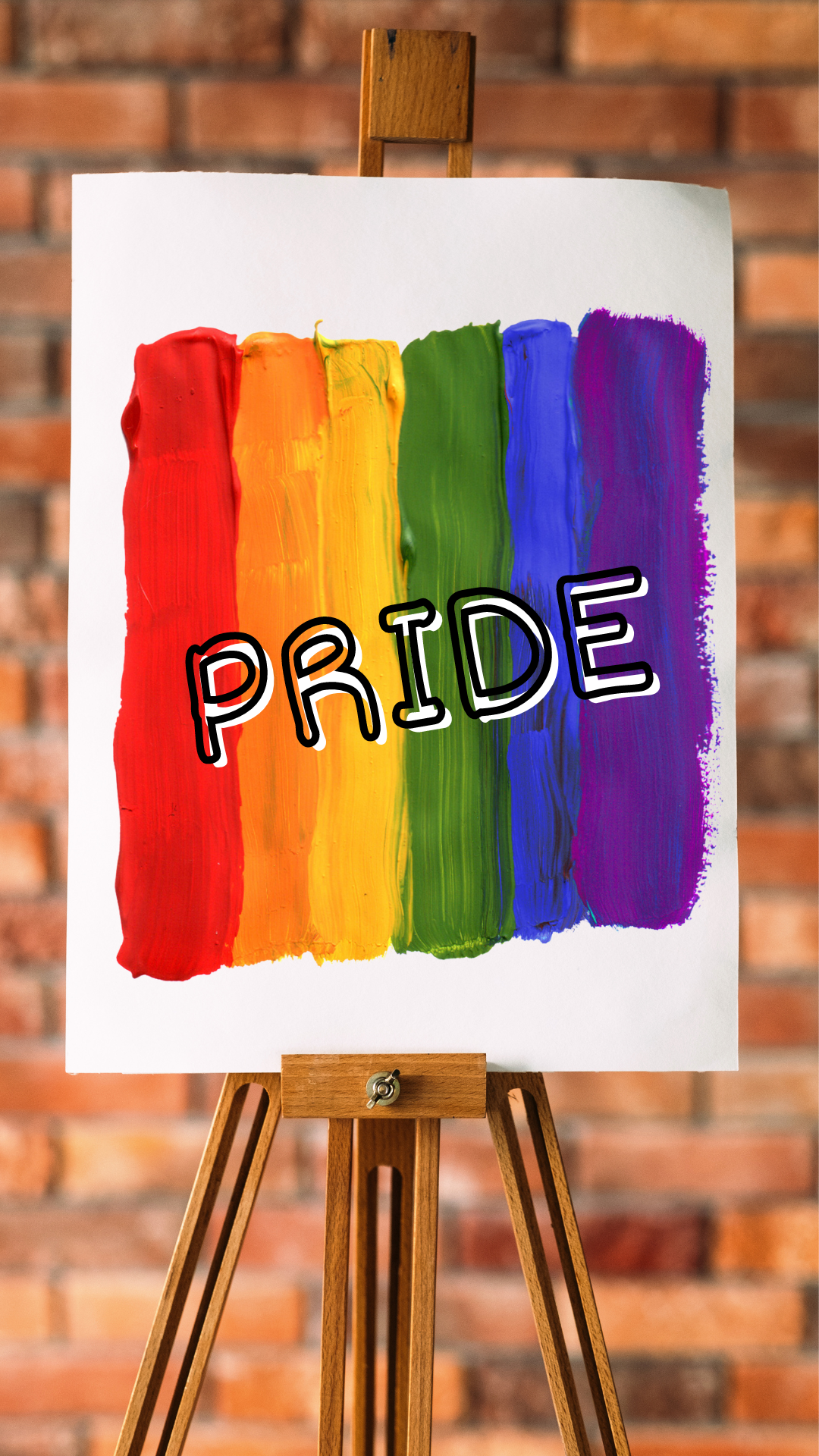 art canvas with  paint in red, orange, yellow, green, blue and indigo and pride written over it.