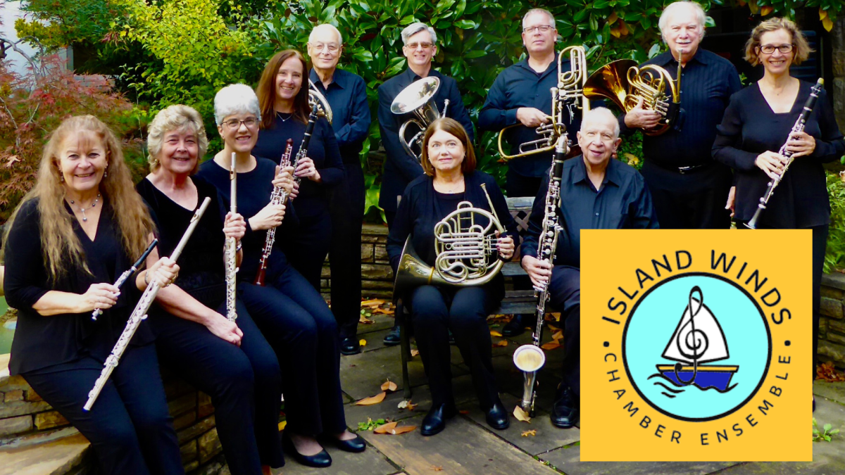 The Island Winds Chamber Ensemble seated outdoors