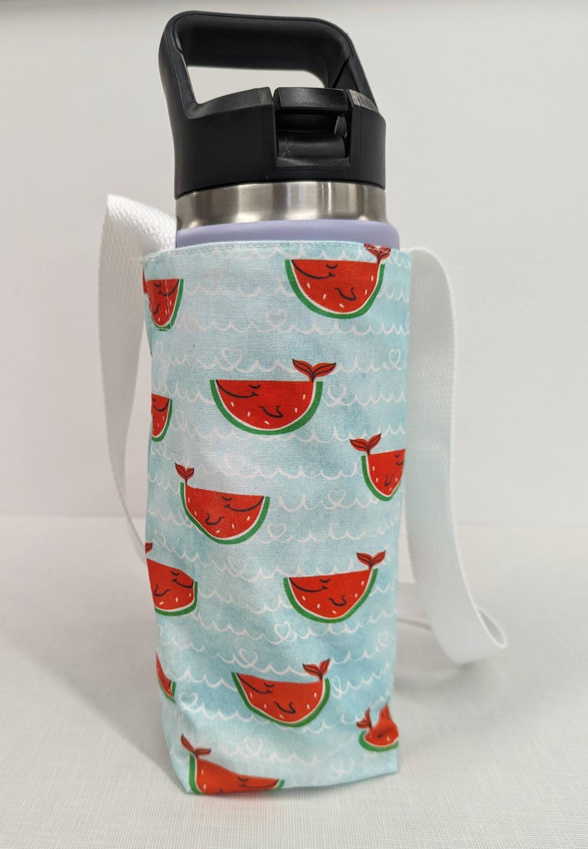 A water bottle in a small bag with a strap