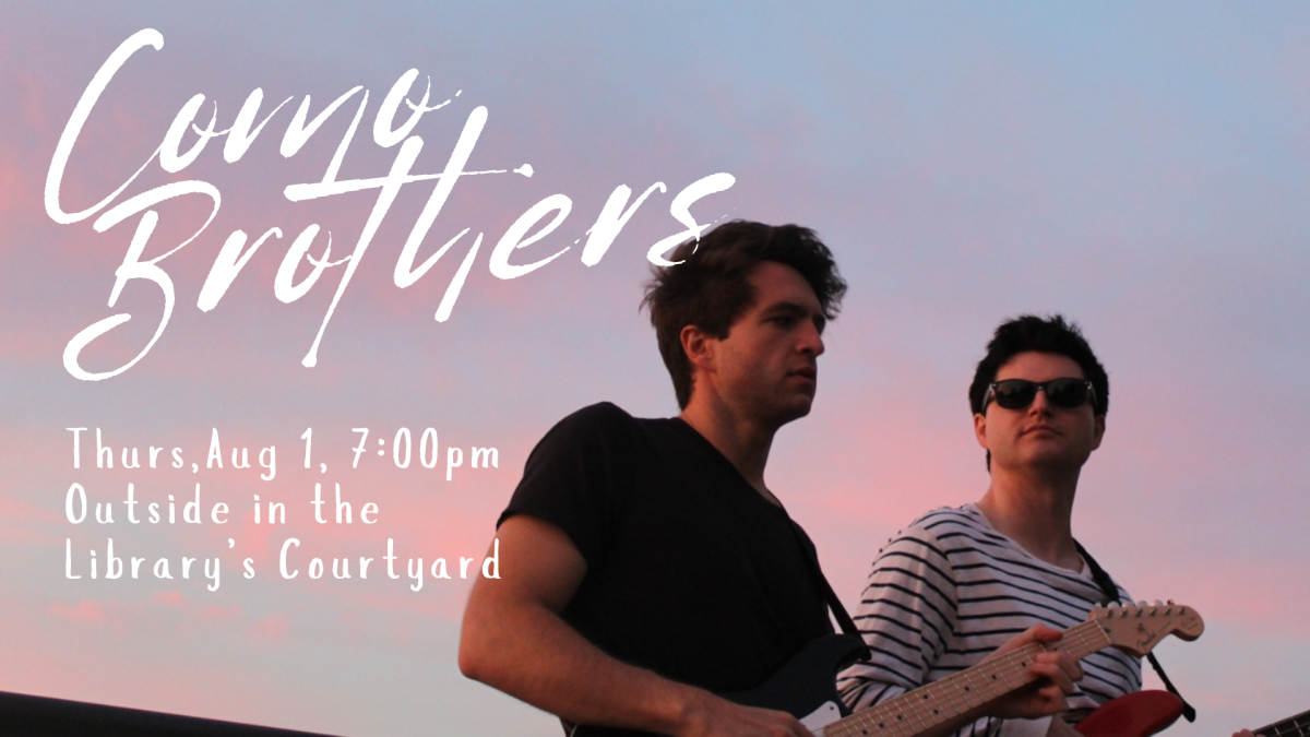 The Como Brothers performing outside.